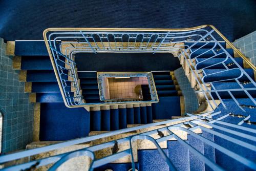 an overhead view of a staircase with blue stairs at Hotel Weidenhof in Regensburg
