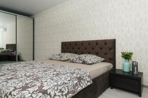 Un ou plusieurs lits dans un hébergement de l'établissement Luxury apart-hotel on Kharkovskaya near Lavina 1 floor