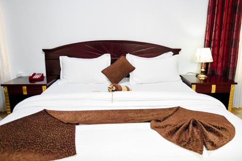 Quiet Haven Hotelにあるベッド