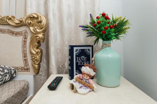 Μια τηλεόραση ή/και κέντρο ψυχαγωγίας στο De LUXE apartments Centr 1 floor