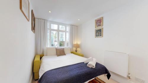 Posteľ alebo postele v izbe v ubytovaní Central London Flat in Westminster