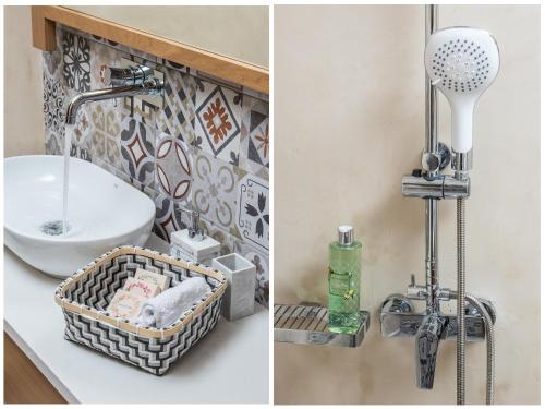 a bathroom with a sink and a shower at Stairs Homes & Suites in Kamária