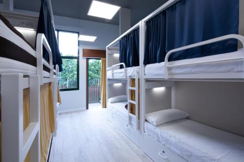 Двухъярусная кровать или двухъярусные кровати в номере Dream in Santiago