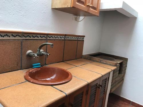 Kuchyň nebo kuchyňský kout v ubytování Primera línea en piscinas naturales.