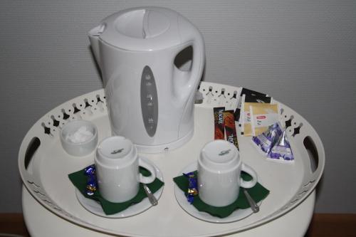 a white blender sitting on top of a table at Hotel Stallbacken Nagu in Nauvo