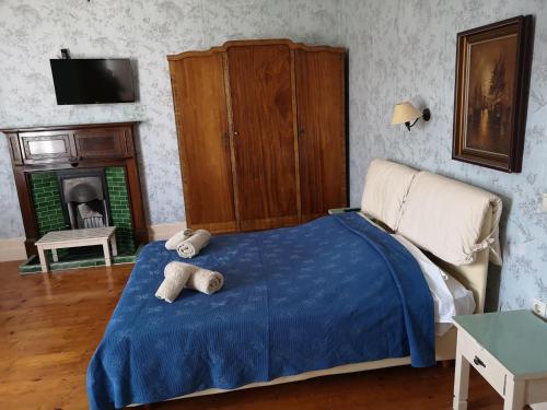 Säng eller sängar i ett rum på Villa Melina