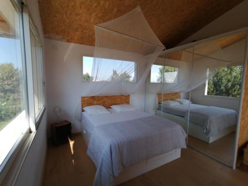 Cama ou camas em um quarto em Domaine Limouzy