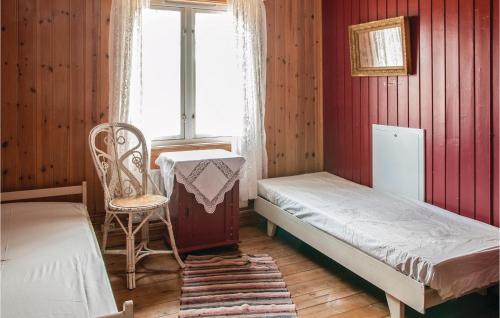 Tempat tidur dalam kamar di Beautiful Home In Tynset With Kitchen
