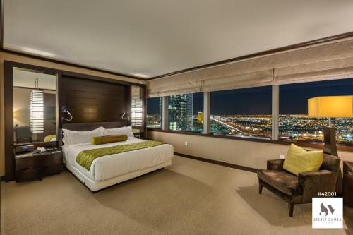 Ένα ή περισσότερα κρεβάτια σε δωμάτιο στο Secret Suites At Vdara