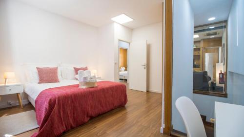 Ένα ή περισσότερα κρεβάτια σε δωμάτιο στο Oporto Yellow Villas