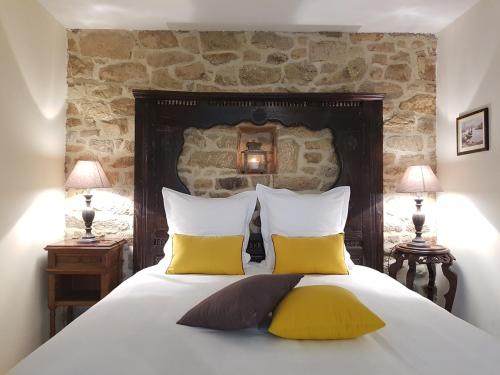 Łóżko lub łóżka w pokoju w obiekcie Domaine de Keryargon, Chambres d'hôtes