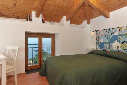 Ένα ή περισσότερα κρεβάτια σε δωμάτιο στο Casa Falcone B&B