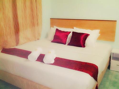 Ένα ή περισσότερα κρεβάτια σε δωμάτιο στο Rose Inn Motel