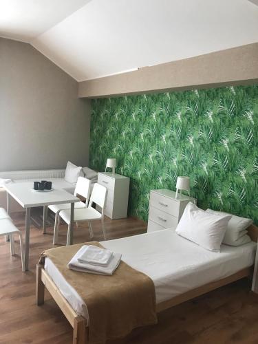 Una cama o camas en una habitación de City Westa Hotel
