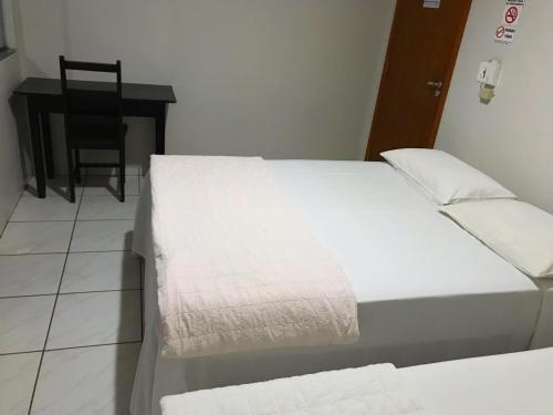 Katil atau katil-katil dalam bilik di Aki Hotel