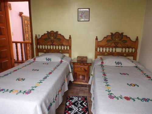 Ένα ή περισσότερα κρεβάτια σε δωμάτιο στο Casa Paanoramica