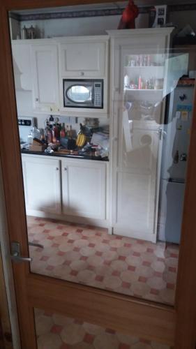 A kitchen or kitchenette at The Townhouse