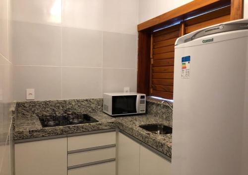 Una cocina o cocineta en Beach Wind Hotel