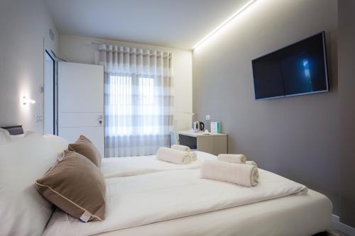 A bed or beds in a room at Borgocinquanta
