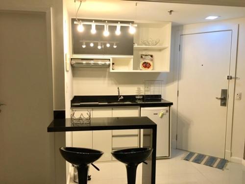 Dapur atau dapur kecil di Loft Confortável e Moderno