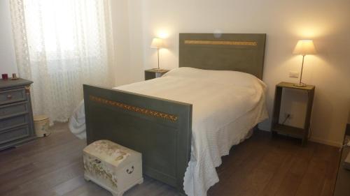 En eller flere senge i et værelse på Al Pergolesi B&B