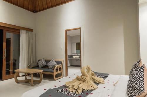 Katil atau katil-katil dalam bilik di Masia Villa Ubud