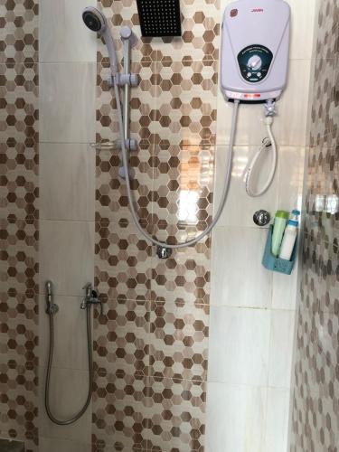 Ванная комната в Villa Ungu Homestay