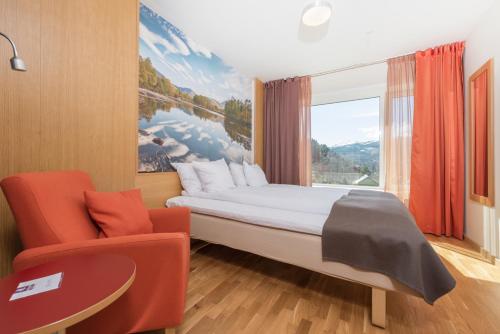 A bed or beds in a room at Thon Hotel Surnadal