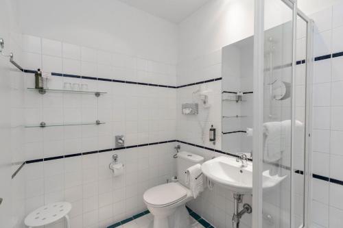 Ett badrum på Hotel Kärntnerhof