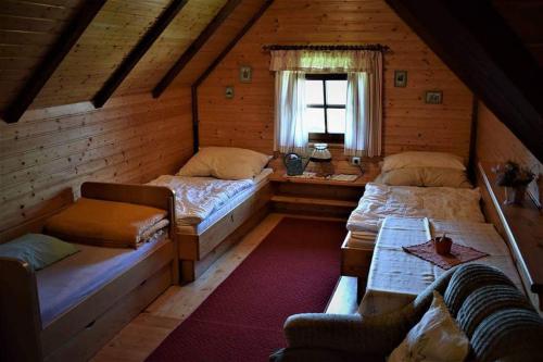 Katil atau katil-katil dalam bilik di Ferienhaus Kreiner