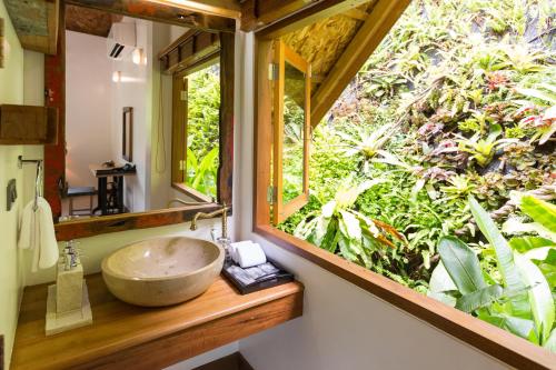 Taman di luar Purana Resort Koh Yao Noi - SHA Extra plus