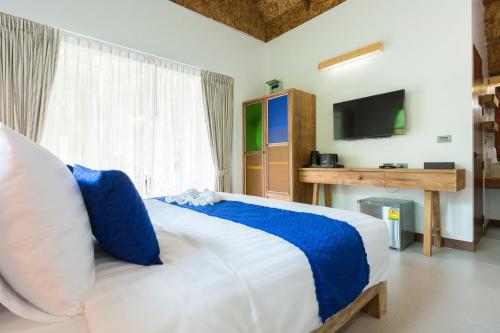 Katil atau katil-katil dalam bilik di Purana Resort Koh Yao Noi - SHA Extra plus