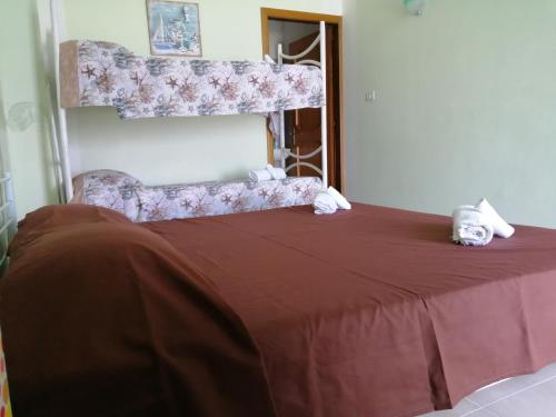 Postel nebo postele na pokoji v ubytování Una terrazza sul mare