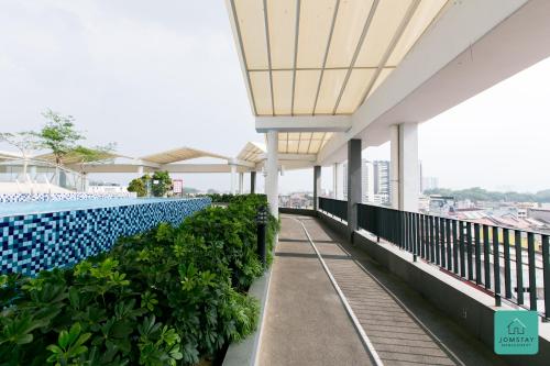 Balkón nebo terasa v ubytování JOMSTAY Octagon Ipoh Suites
