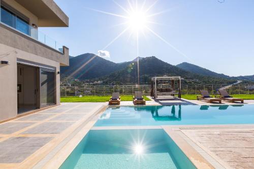 Oraia Eleni Villa, with Pool, BBQ, Playground & SeaViews, By ThinkVilla