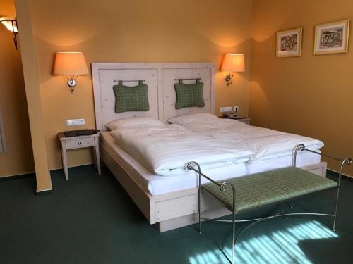 Postel nebo postele na pokoji v ubytování Gasthaus Beinker