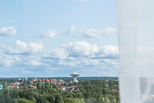 a view of a city with a water tower at Best Western Eurostop Orebro in Örebro