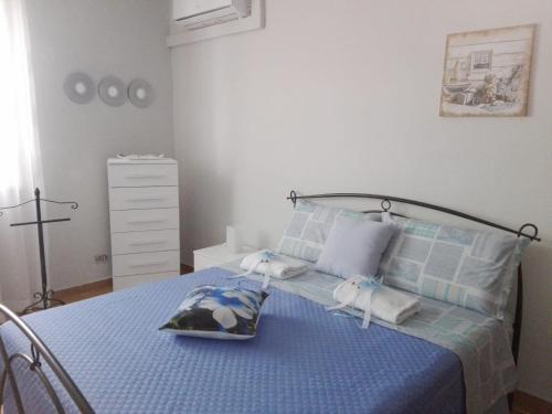 A bed or beds in a room at A Casa Mia