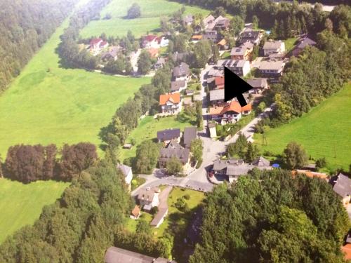 a large group of houses on a hill at Alpin Chic in Grödig