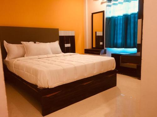 Postel nebo postele na pokoji v ubytování MM Park Inn