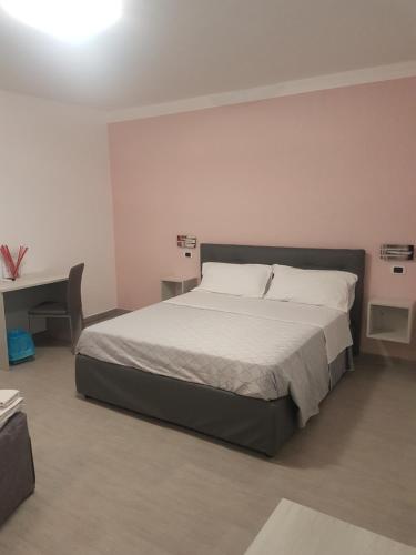 Katil atau katil-katil dalam bilik di Alba de Mar B&B