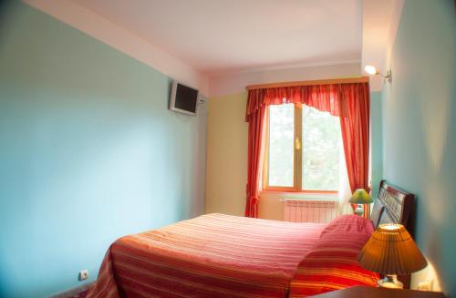 Cama o camas de una habitación en Vosku Ashxarh Hotel