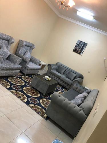 Ein Sitzbereich in der Unterkunft Zaer Al Fakhama Hotel Apartments