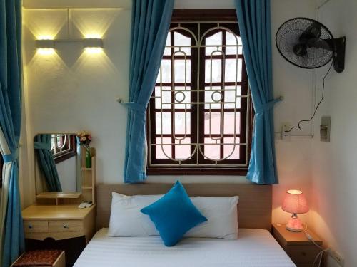 Postel nebo postele na pokoji v ubytování Hanowood Homestay