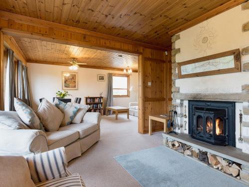 A seating area at Hadrians Garden Cottage 