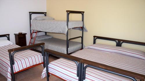 Posteľ alebo postele v izbe v ubytovaní Residence Praetorium Maiella Park
