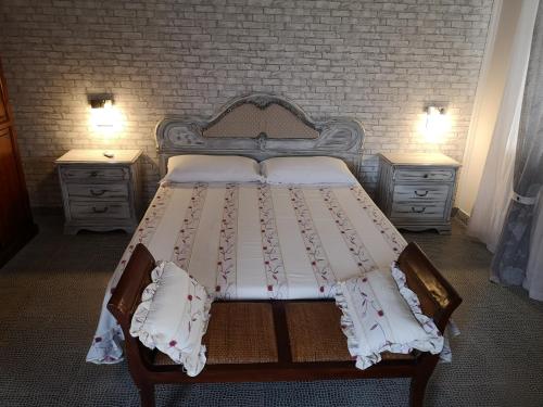 Кровать или кровати в номере Radici b&b