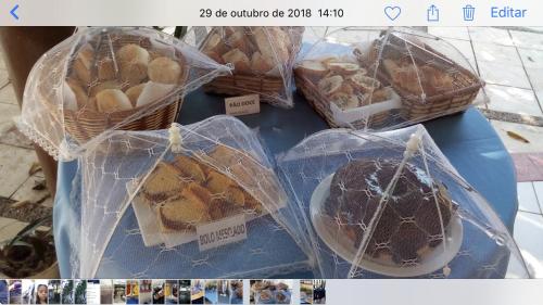 a bunch of pastries in plastic bags on a table at Pipa Flat Solar in Pipa
