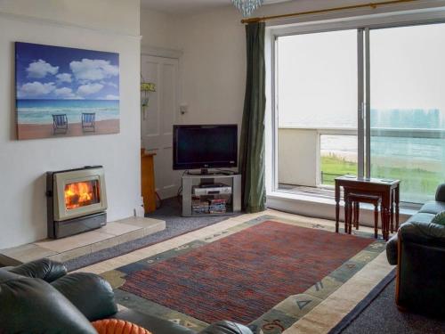 A television and/or entertainment center at Mayfair Apartment 