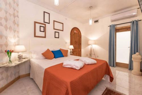 Giường trong phòng chung tại Kikka B&B